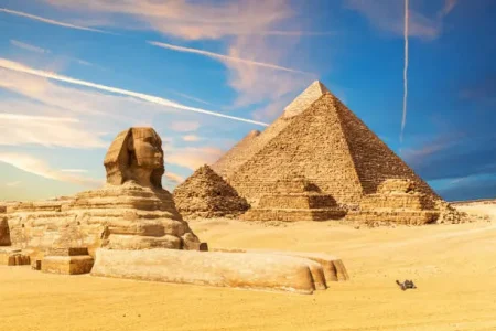 Tourists visiting the Great Pyramids of Giza in Cairo Egypt